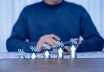 Interest rate and mortgage rates concept. Businessman showing percentage and the rate increases,...