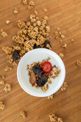 A vibrant and healthy plate of fresh fruit paired with crunchy cereal, offering a perfect balance of sweetness and texture. This delightful dish makes for a refreshing and energizing breakfast, packed
