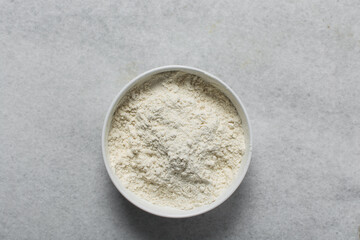 overhead view of All purpose flour, top view of baking flour in a bowl