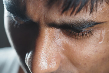 Close-up of a person deep in thought during a quiet moment