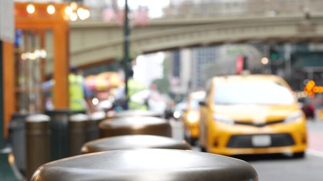 New York City Grand Central Terminal railway station, 42 street. Manhattan Midtown. Yellow taxi cab row, car transport, Pershing Square bridge, USA. American road traffic, people, telephone box kiosk.