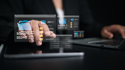 Document Management System (DMS) being setup by IT consultant working on laptop computer in office, Businesswoman using computer to document management, Workflow sharing, Backup online document files