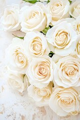 Obraz premium Elegant Bouquet of Creamy White Roses on Rustic Wooden Background
