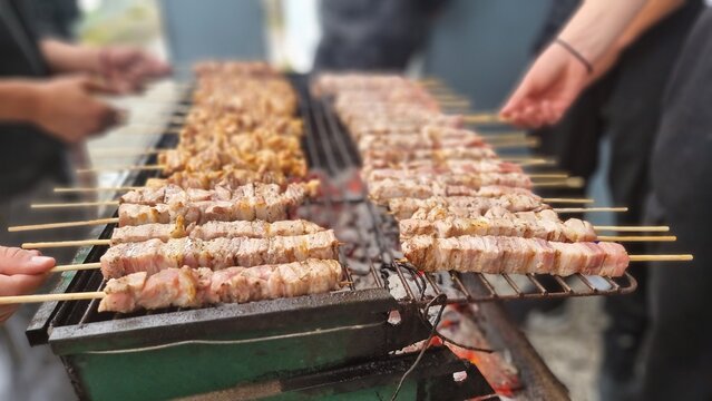 suvlakia cooking teamwork prepering food