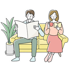 ソファーでくつろぐ若い男女