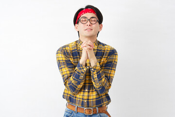 Fototapeta premium アキバ系の男性 祈る 白背景