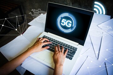 person using a laptop with a futuristic 5G network interface. Digital connection, fast internet, and technology concept with glowing elements. Ideal for business, innovation, and communication.