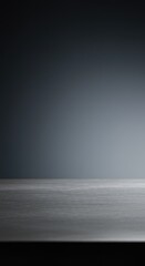 Smooth dark grey surface with subtle gradient and soft lighting, creating a professional atmosphere.