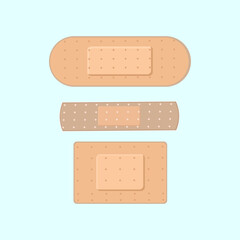 Set of three flat medical Band-aids on a light background