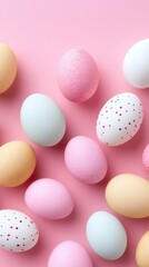 Obraz premium Colorful eggs arranged on a soft pink surface, celebrating the joy of Easter.