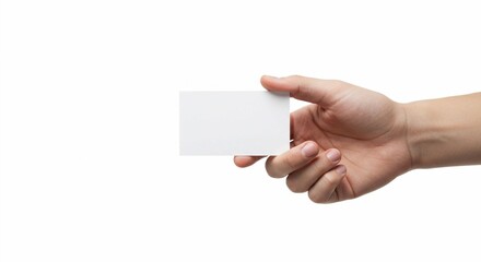 Obraz premium Creating a minimalist mockup for business or invitation presentations, a hand holds a blank white card against a clean white background