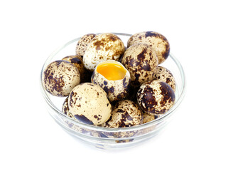 Glass bowl with several quail eggs isolated on white background	