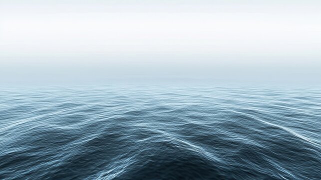 Serene Ocean Waves Under a Misty Sky