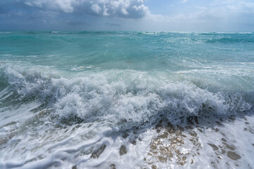Ocean waves, summer background. Stormy sea waves. Summer sea beach wave. Foamy ocean waves. Summer ocean breeze. Dreamy summer beach background. Ocean splash waves.