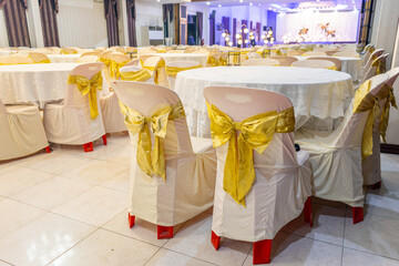 Empty hall with podium decorated for celebration