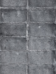 Large brick wall, old gray cement block wall texture background.