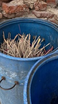 Bucket of Sticks Emptied Gradually
