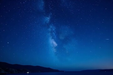 Fototapeta premium A serene blue night sky full of twinkling stars, Starry, cosmic