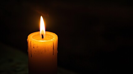 A poetic, gentle design with a single candle flame glowing softly in the darkness. Minimalist and emotional, symbolizing hope, remembrance, and quiet reflection.

