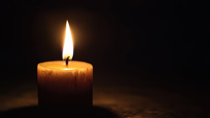 A poetic, gentle design with a single candle flame glowing softly in the darkness. Minimalist and emotional, symbolizing hope, remembrance, and quiet reflection.
