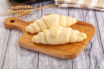 Raw uncooked croissant for bake