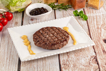 Grilled juicy beef cutlet for burger