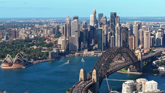 Drone video of the north side of Sydney CBD. Captured from North Sydney featuring Circular Quay, the Harbour Bridge and the Opera House as the drone slowly pans east