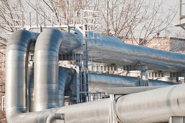 pipeline line close-up with city and buildings in the background
