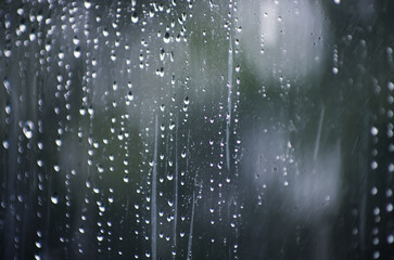 Rain drops on window glasses surface.