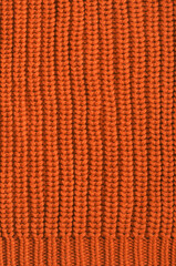 Orange knitted fabric background texture
