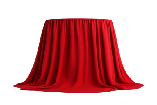 Red cloth is draped over a table, creating a sense of mystery and anticipation, isolated