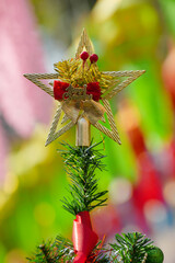 star christmas decoration on a tree