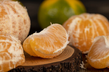 peeled orange ripe tangerines on the table