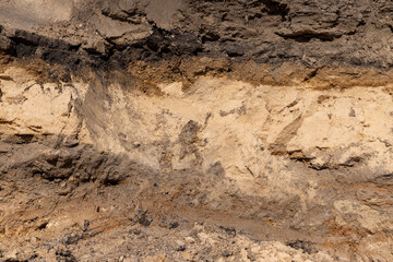 a deep hole in the ground on the site of which a highway was started
