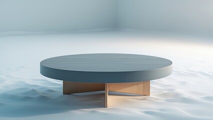 Grey circular coffee table on a white backdrop. Isolated