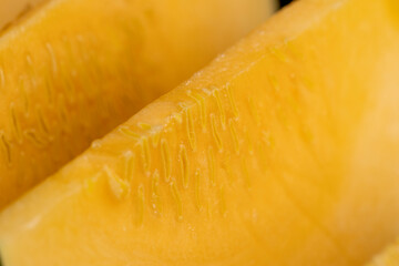 soft ripe orange pumpkin cut into several pieces