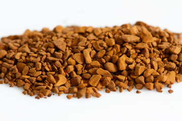 Instant coffee and freeze dried coffee on white background ; close up