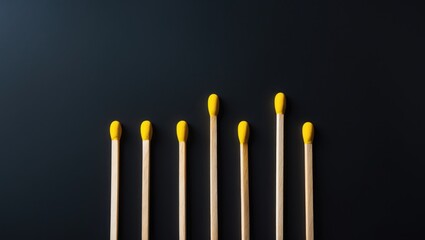 Matches with yellow heads illustrating the number five depicted as tally marks, with the fifth matchstick figure crossing diagonally to create a goal.
