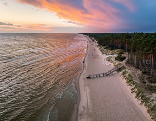 A breathtaking sunset over Jūrmala Beach’s golden sands and calm waves.