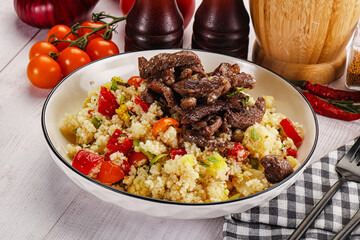 Traditional couscous with beef and vegetables