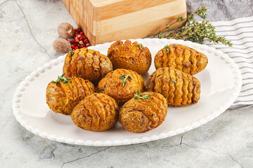 Baked baby potato with thyme