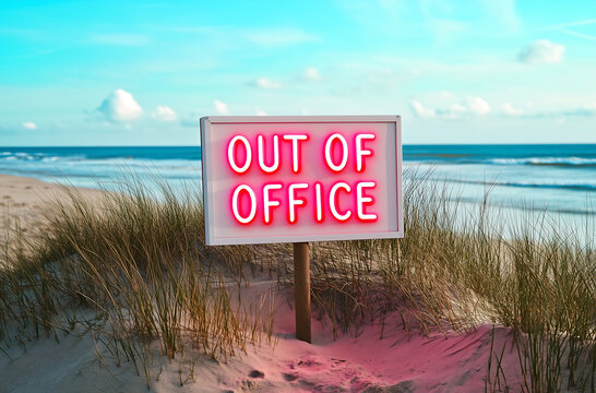 Vacation and summer break concept with "Out of Office" neon sign on a wooden post in a coastal sand dune setting