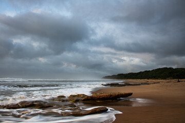 Wild coast beach at sunrise