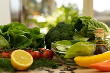 The process of making a vegetable salad. Healthy food. Cucumber salad