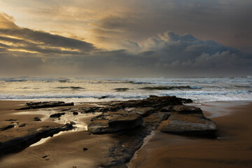 Dawn on a rocky beach, Wild Coast, South Africa