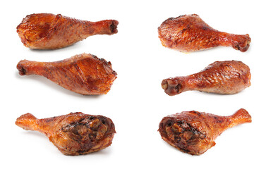 Delicious turkey drumsticks on white background, set