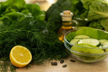 The process of making a vegetable salad. Healthy food. Cucumber salad