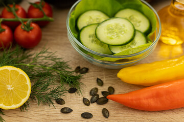 Beautiful fresh vegetables on the table. Preparation of salad. Vegetable slices