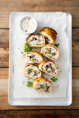 Homemade omelette roulade with chicken
