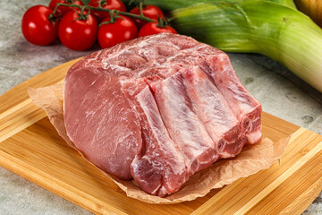 Raw pork loin cut with bone